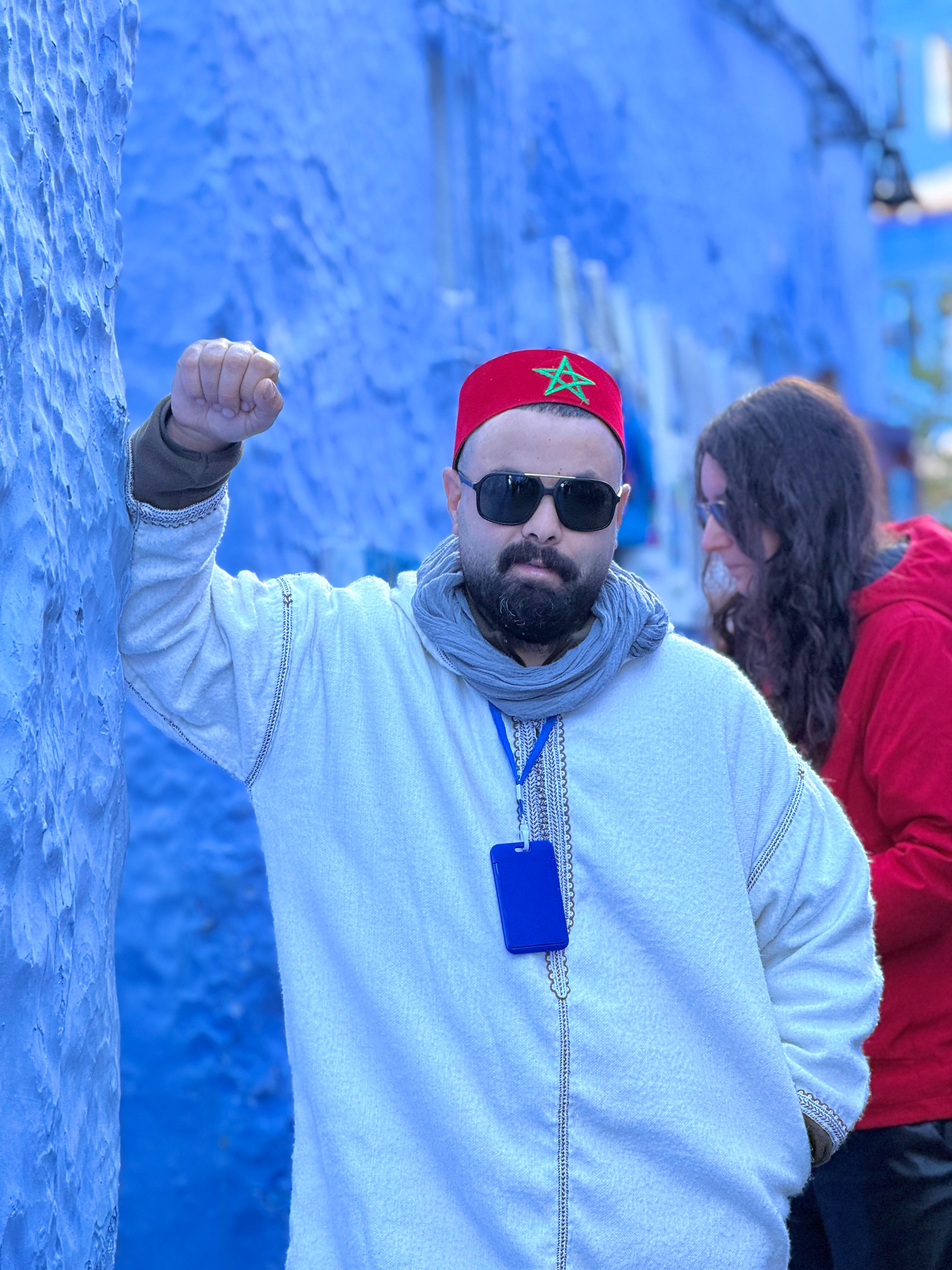Traveler in Chefchaouen blue medina